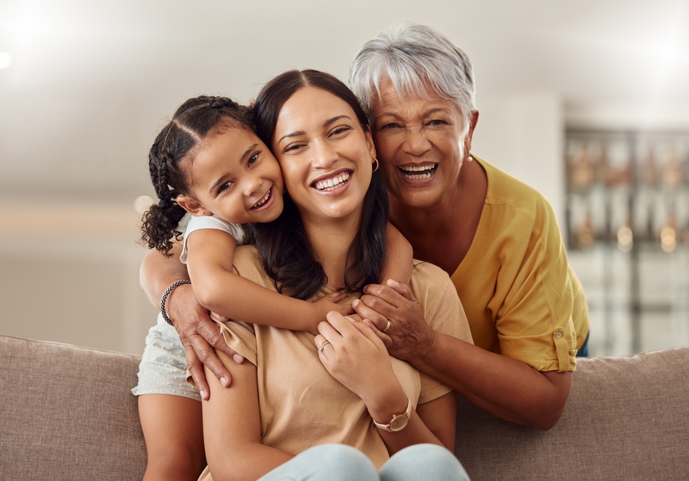 A joyful three-generation family smiles, feeling comfortable and relaxed with sedation dentistry in Castle Rock at Castle Rock Family Dental